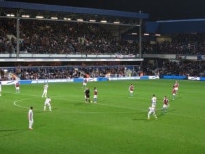 In-game football action at Loftus Road, home of Queens Park Rangers.