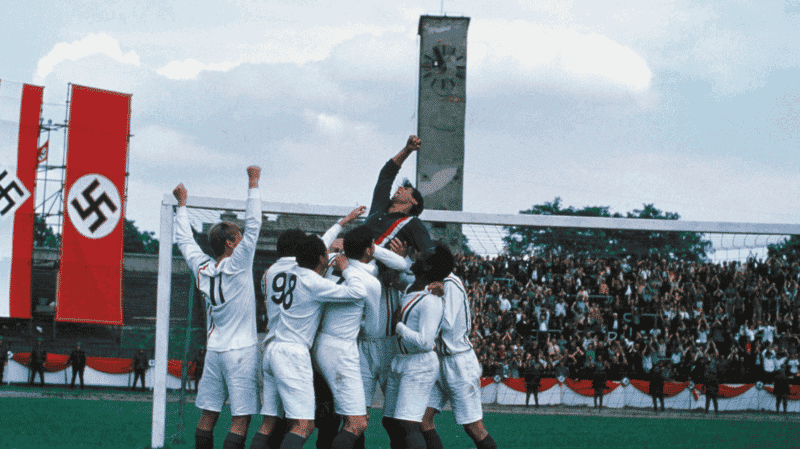 Nazi flag soccer players lift Sylvester Stallone in Escape to Victory movie