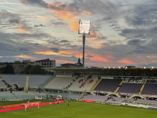 sunset over a football stadium