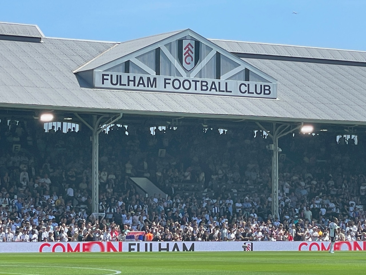 a view of Fulham's football ground filled with supporters