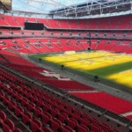 Wembley Stadium will see some fans returning in April. fans return english soccer wembley