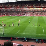 view of players on field from Arsenal hospitality seats at Emirates Stadium