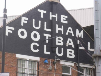 There are a lot of old-fashioned touches like this around the ground at Fulham FC. "The Fulham Football Club" written on the side of Craven Cottage in London.