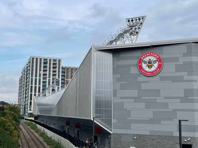 football stadium next to a railroad line