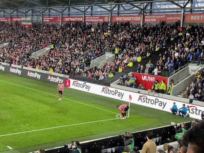 football player preparing for a corner kick