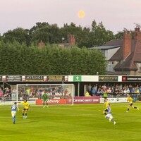 Moon over the traveling Stockport County fans at Harrogate Town.