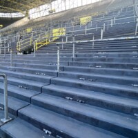 looking up a huge football stand of terraces