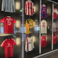 football shirts in a case