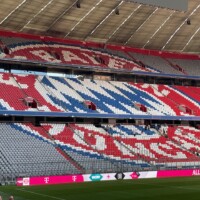 bayern munich crest on seats in the stadium