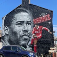 John Barnes also famously won the league for Arsenal with a last-minute goal -- at Anfield!